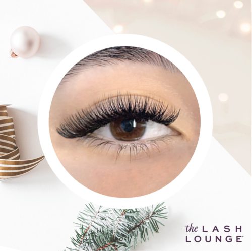 close-up of woman's eye with volume eyelash extensions